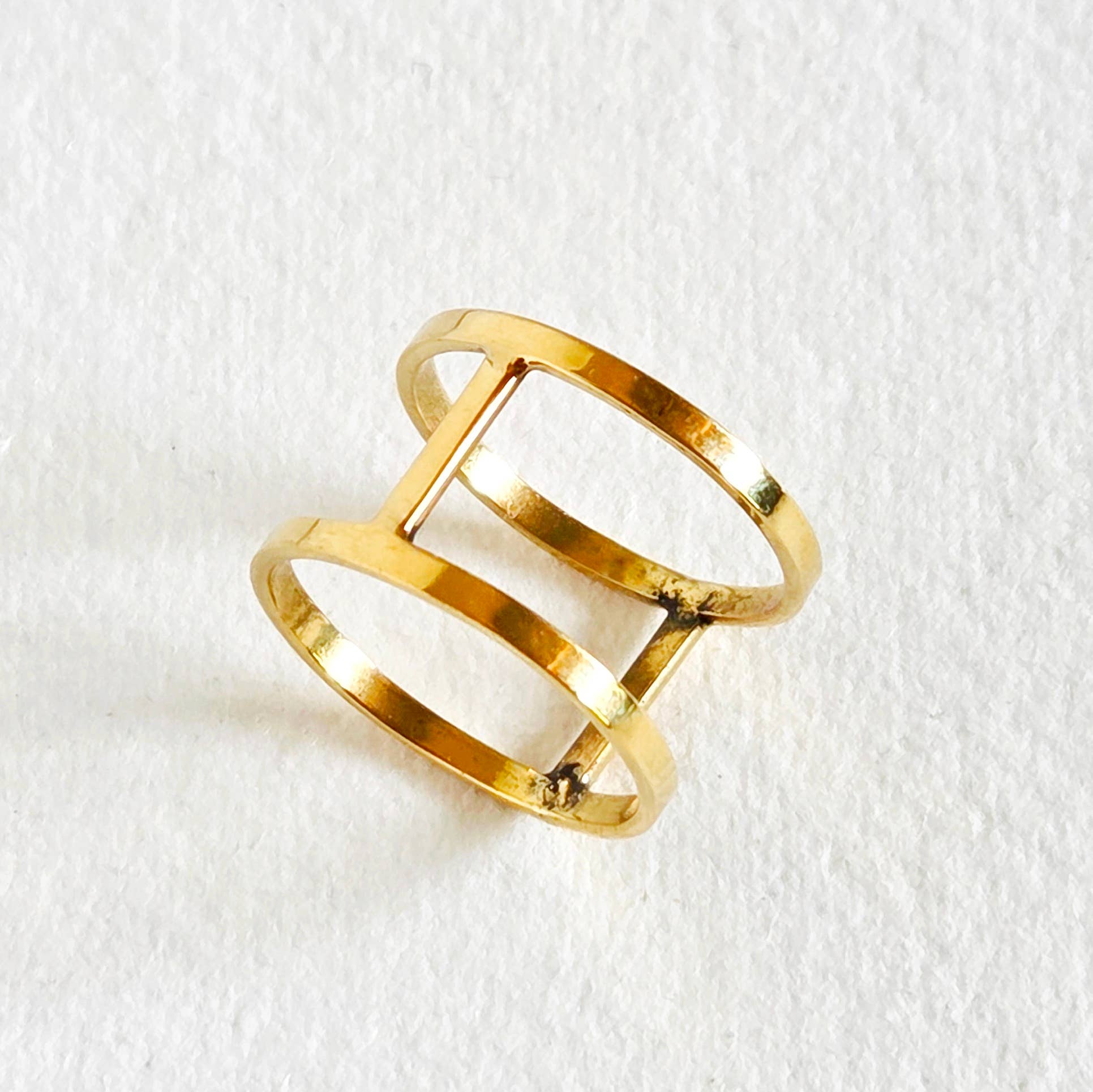 Caged Open Connected Ring